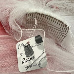 Cathedral length veil with lettuce edge and blusher